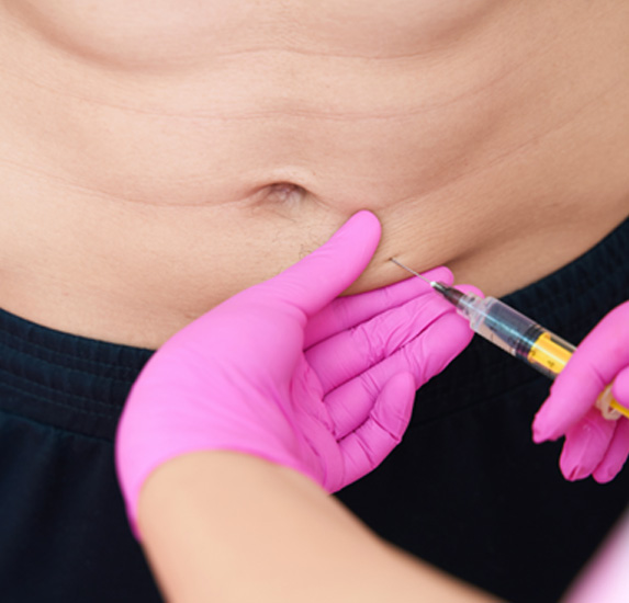 A doctor performing an injection treatment