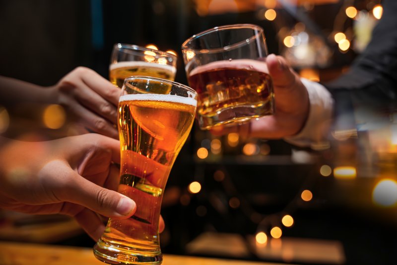 Friends toasting glasses of alcohol